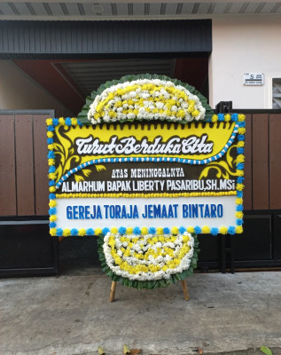 Papan Bunga Duka di Panji